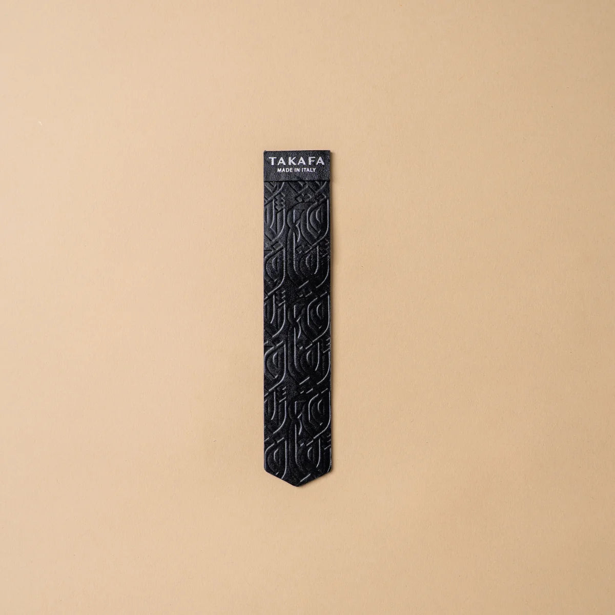 TAKAFA Original luxury leather bookmark in Black, full-grain Bos Taurus Italian leather with debossed Takafa metallic emblem